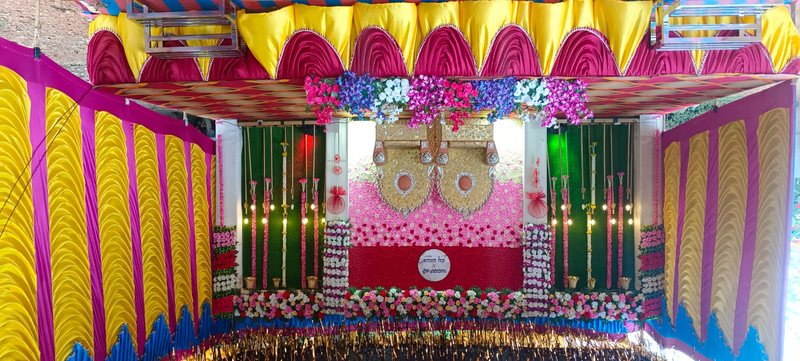 Royal wedding stage with gold thrones by G C M Events